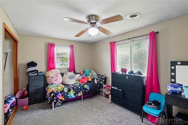 813 Kenosha Rd, Kettering, OH 45429 - bedroom featuring a ceiling fan, visible vents, and carpet