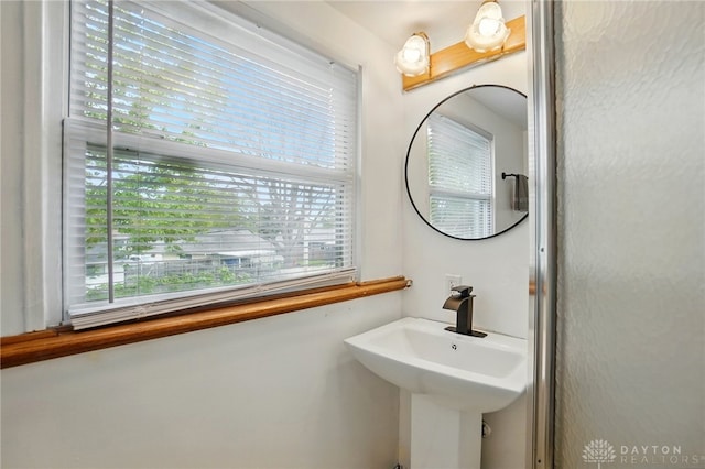 813 Kenosha Rd, Kettering, OH 45429 - bathroom with a sink and a wealth of natural light