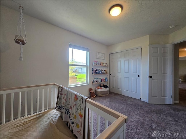 carpeted bedroom with a closet