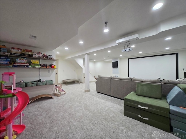 playroom featuring recessed lighting, carpet flooring, and a wall mounted air conditioner