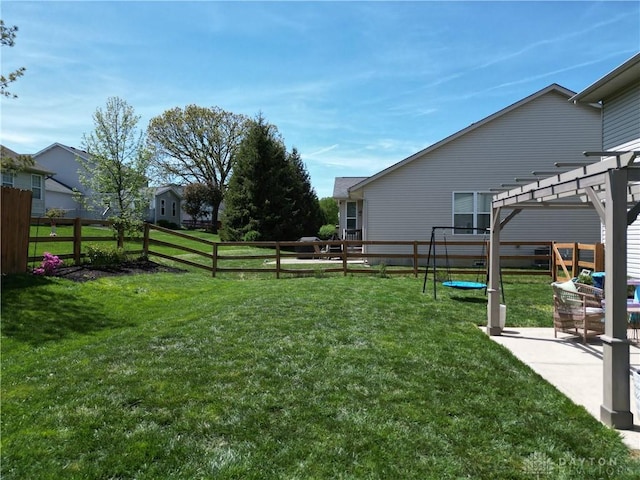 view of yard featuring a pergola and a fenced backyard
