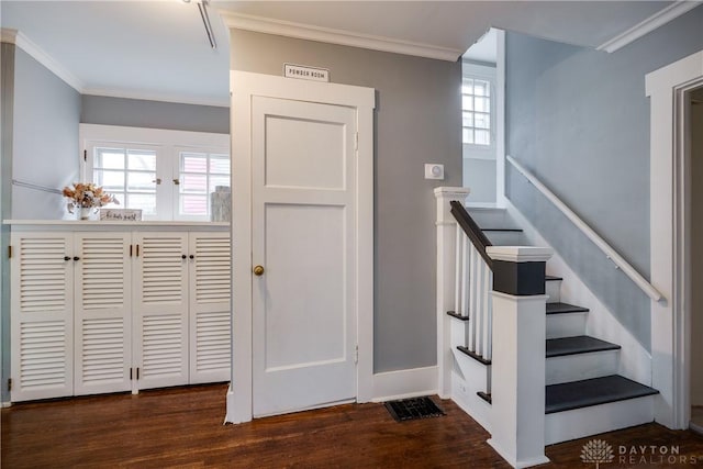 94 Patterson Rd, Oakwood, OH 45419 - stairway featuring baseboards, ornamental molding, and wood finished floors