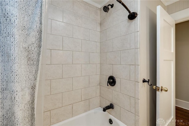 94 Patterson Rd, Oakwood, OH 45419 - full bathroom featuring baseboards and shower / bath combo