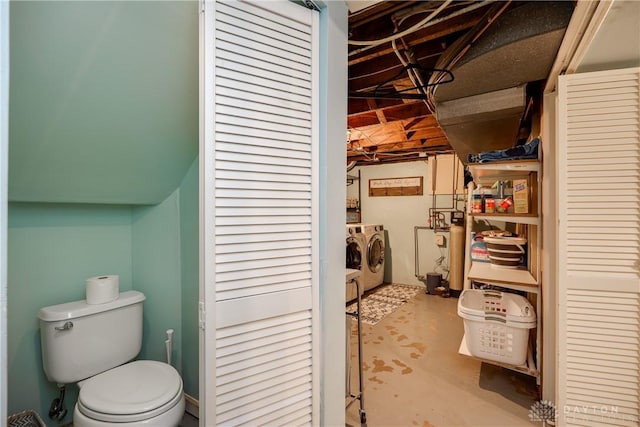 94 Patterson Rd, Oakwood, OH 45419 - interior space featuring concrete floors, washing machine and dryer, and toilet