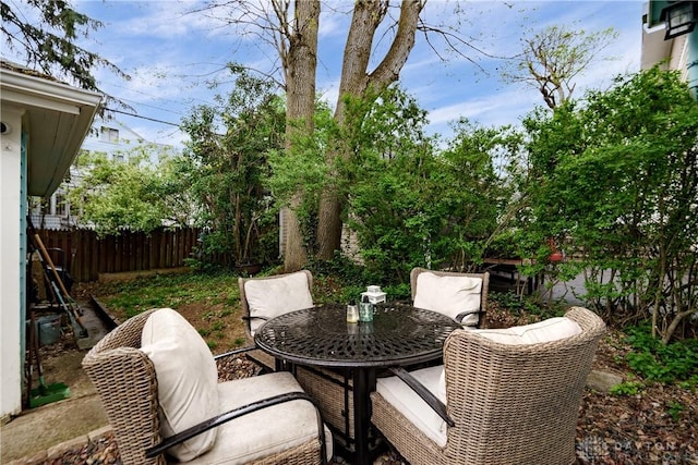 94 Patterson Rd, Oakwood, OH 45419 - view of patio / terrace featuring fence and outdoor dining space