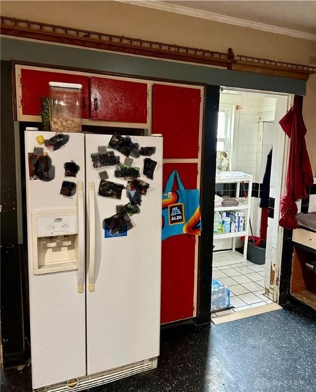 details with ornamental molding and white fridge with ice dispenser