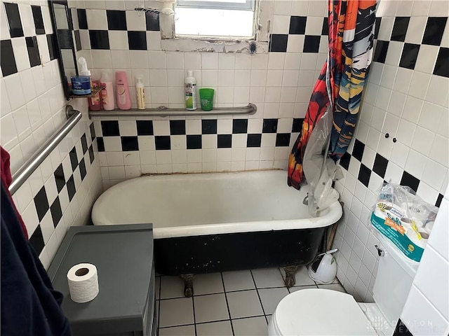 1615 Xenia Ave, Dayton, OH 45410 - full bathroom featuring tile walls, a bath, tile patterned flooring, and a shower with shower curtain
