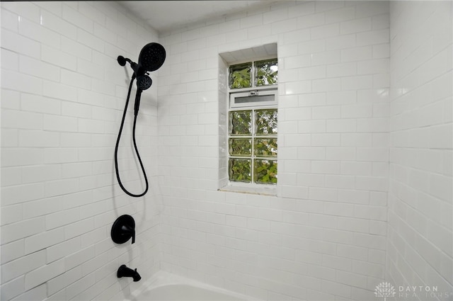 full bath featuring bathing tub / shower combination