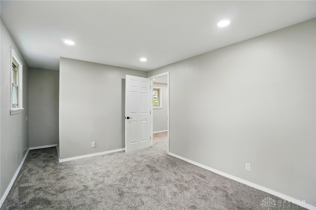 interior space featuring baseboards, carpet, and recessed lighting