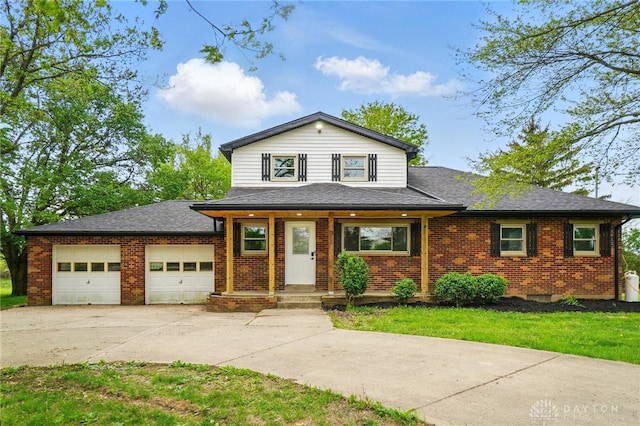 traditional home featuring brick siding, driveway, a shingled roof, and a garage