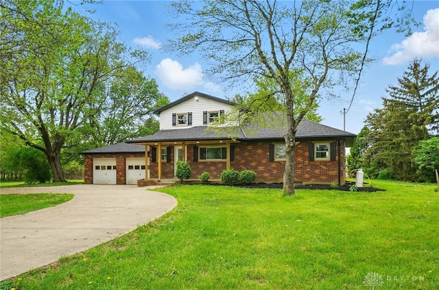 view of front of house featuring concrete driveway, brick siding, a front yard, and a garage