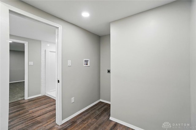 corridor with baseboards, recessed lighting, and dark wood finished floors
