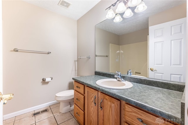 bathroom featuring visible vents, baseboards, tile patterned flooring, and a chandelier