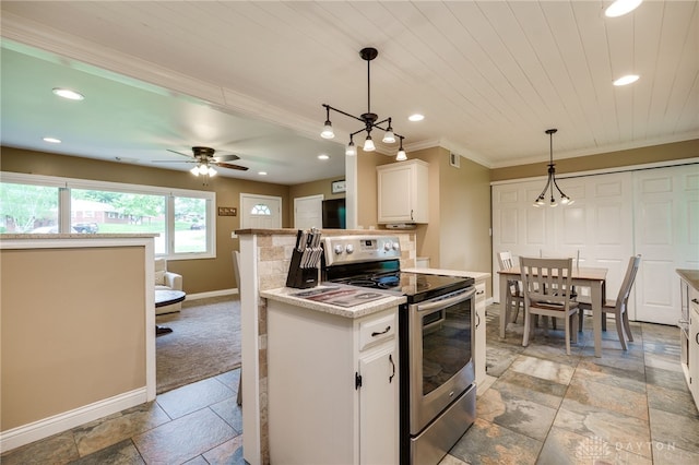2661 Powhattan Pl, Dayton, OH 45420 - kitchen with ornamental molding, stone tile floors, baseboards, recessed lighting, and stainless steel range with electric cooktop