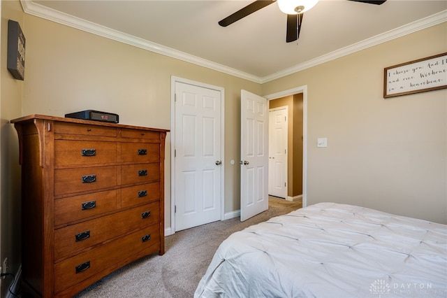 2661 Powhattan Pl, Dayton, OH 45420 - bedroom featuring crown molding, baseboards, ceiling fan, and light colored carpet
