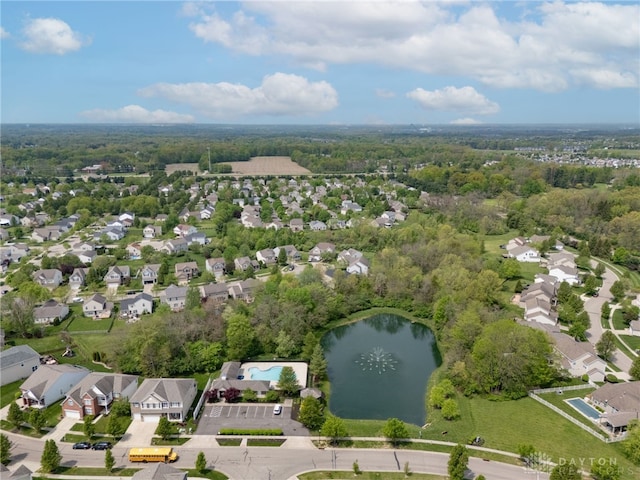 aerial view featuring a residential view and a water view
