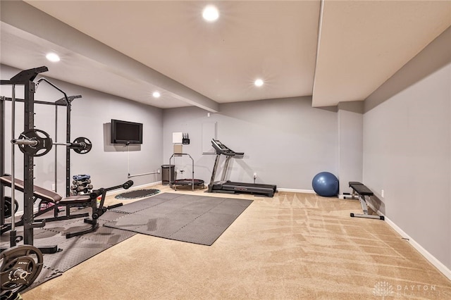 workout area featuring recessed lighting, carpet, and baseboards