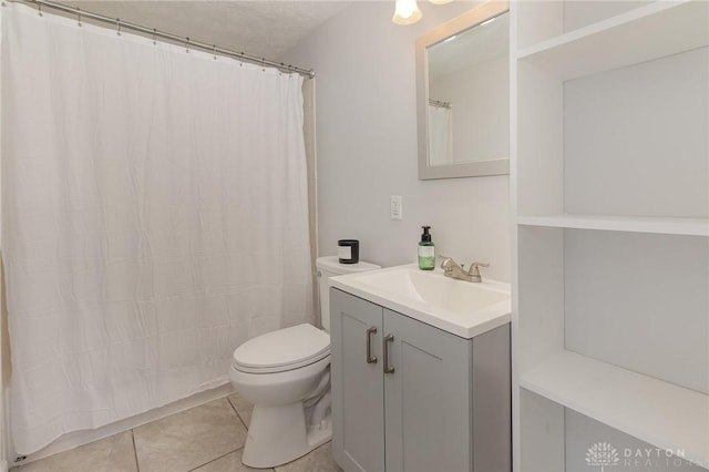 12 N Water St, Lebanon, OH 45036 - bathroom featuring tile patterned floors, toilet, vanity, and a shower with curtain