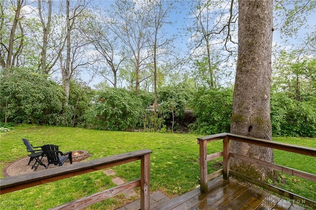 12 N Water St, Lebanon, OH 45036 - deck featuring an outdoor fire pit and a yard