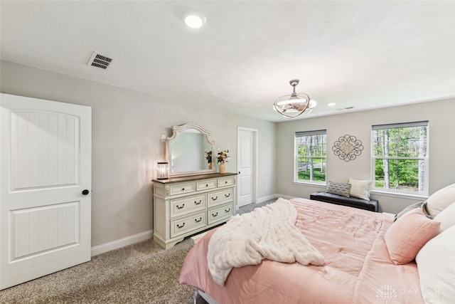 2187 Hamilton Rd, Lebanon, OH 45036 - carpeted bedroom with an inviting chandelier, baseboards, recessed lighting, and visible vents