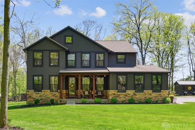 2187 Hamilton Rd, Lebanon, OH 45036 - view of front of home with a porch, roof with shingles, a front yard, and stone siding