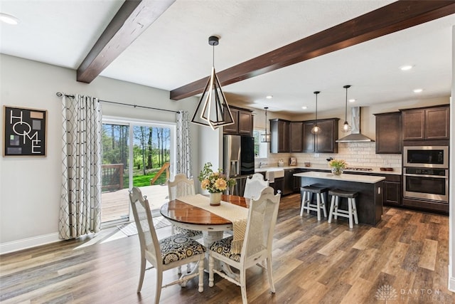 2187 Hamilton Rd, Lebanon, OH 45036 - dining area featuring recessed lighting, beamed ceiling, dark wood-style floors, and baseboards