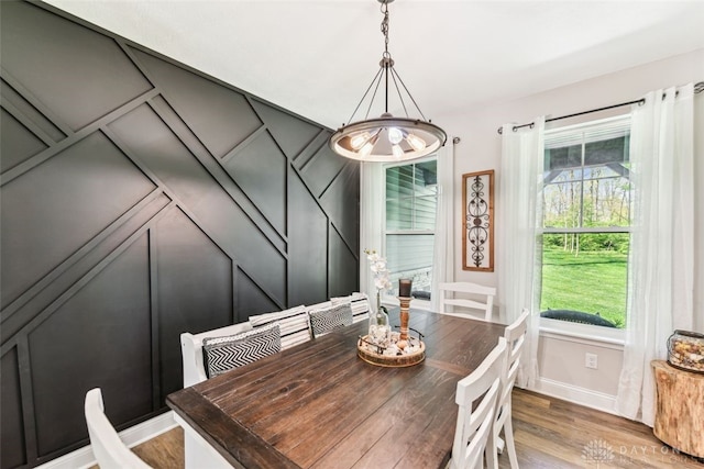 2187 Hamilton Rd, Lebanon, OH 45036 - dining room featuring baseboards, a decorative wall, and wood finished floors