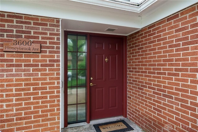 3600 Honeybrook Ave, Dayton, OH 45415 - view of exterior entry featuring brick siding