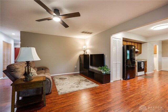 3600 Honeybrook Ave, Dayton, OH 45415 - living area with baseboards, ceiling fan, wood finished floors, and visible vents