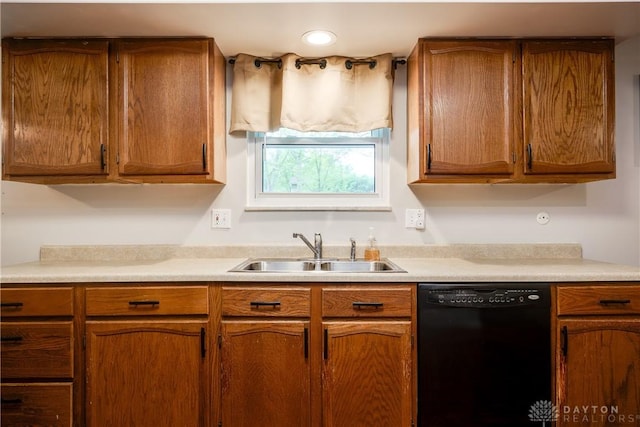3600 Honeybrook Ave, Dayton, OH 45415 - kitchen with a sink, light countertops, brown cabinetry, and black dishwasher