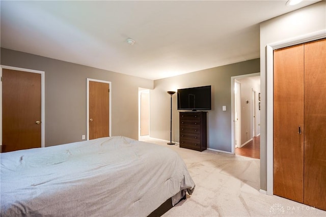 3600 Honeybrook Ave, Dayton, OH 45415 - bedroom featuring baseboards and light carpet