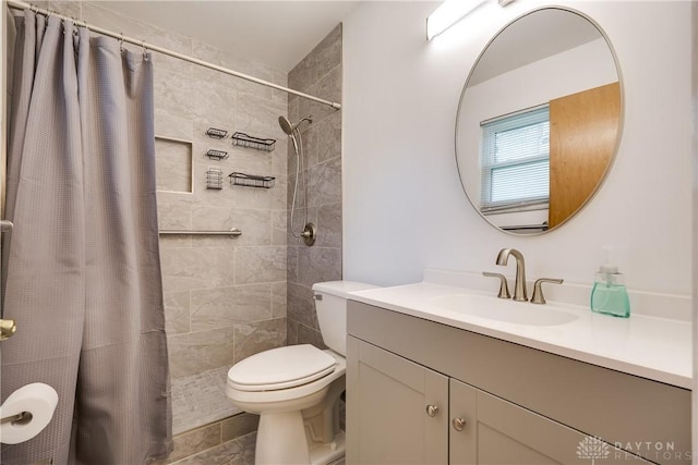 3600 Honeybrook Ave, Dayton, OH 45415 - bathroom with toilet, tiled shower, and vanity