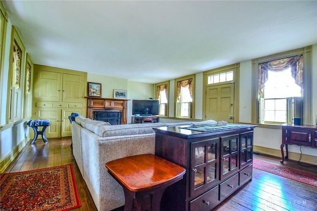 2100 Wagner Trace Dr, Beavercreek, OH 45431 - living room with dark wood-type flooring, a fireplace, and baseboards