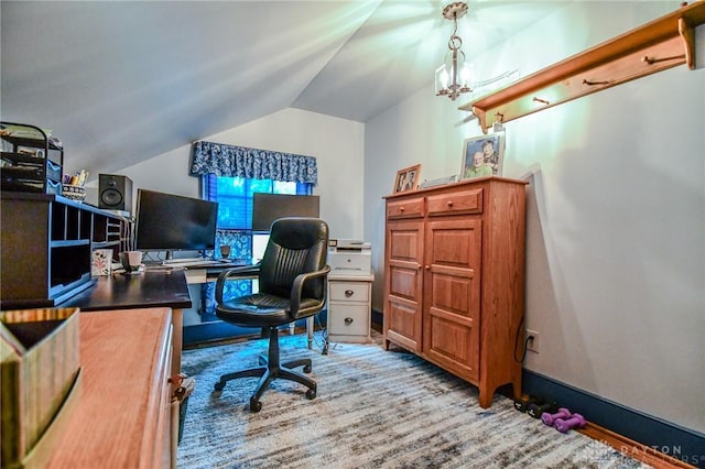 office area featuring vaulted ceiling