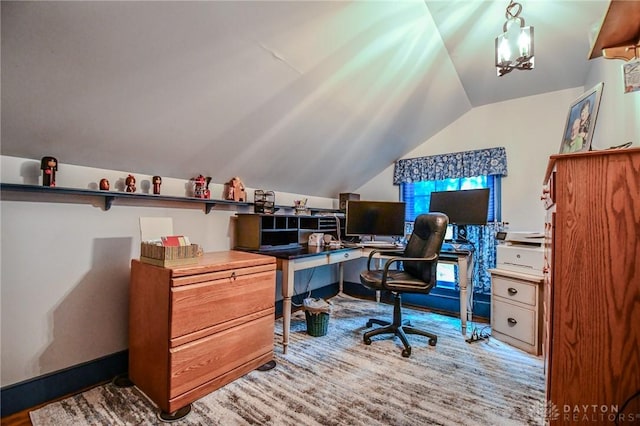 office space featuring lofted ceiling