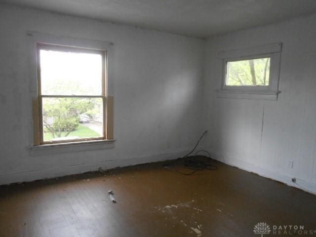 empty room featuring wood finished floors