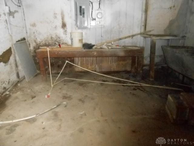 unfinished below grade area featuring electric panel