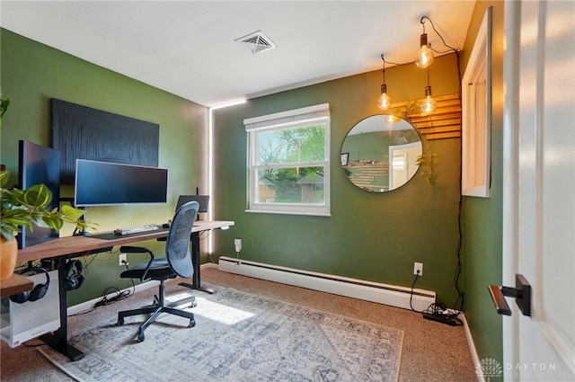 office with visible vents, baseboards, carpet, and a baseboard heating unit