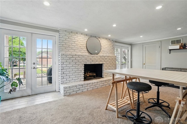interior space with recessed lighting, visible vents, plenty of natural light, and french doors
