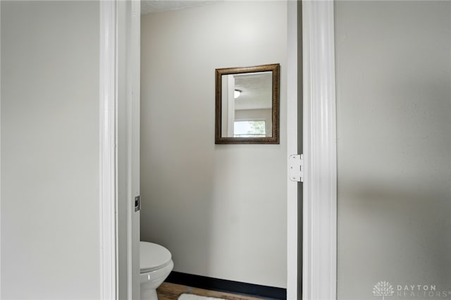 59 Janet Ave, Carlisle, OH 45005 - bathroom featuring baseboards and toilet