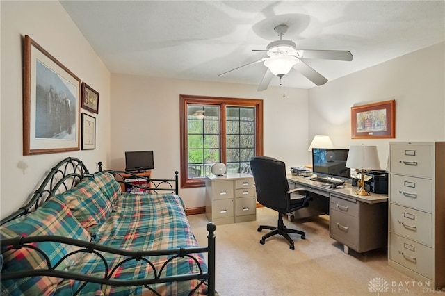 office featuring ceiling fan and light carpet