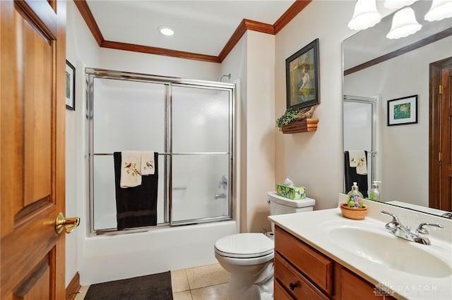 bathroom with vanity, toilet, tile patterned floors, ornamental molding, and bath / shower combo with glass door