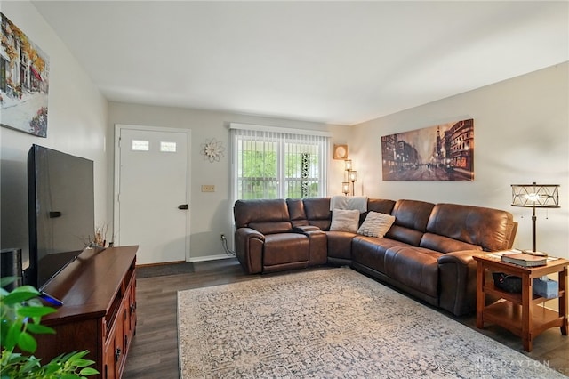 317 Ironwood Dr, West Carrollton, OH 45449 - living room featuring dark wood-style flooring and baseboards