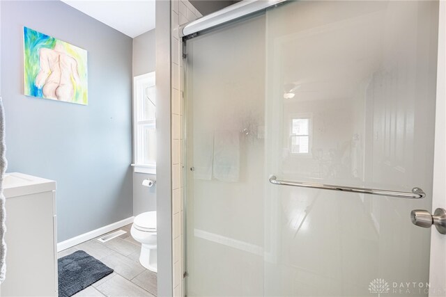 19 Klee Ave, Dayton, OH 45403 - bathroom with a stall shower, vanity, and tile patterned floors