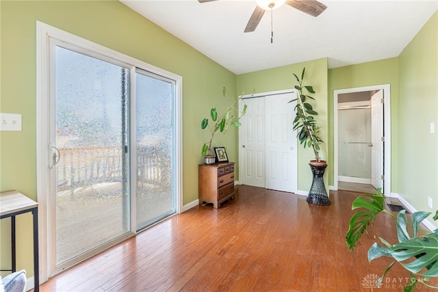 19 Klee Ave, Dayton, OH 45403 - bedroom featuring access to outside, wood finished floors, ceiling fan, and a closet