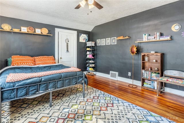19 Klee Ave, Dayton, OH 45403 - bedroom with wood finished floors, a textured ceiling, and ceiling fan