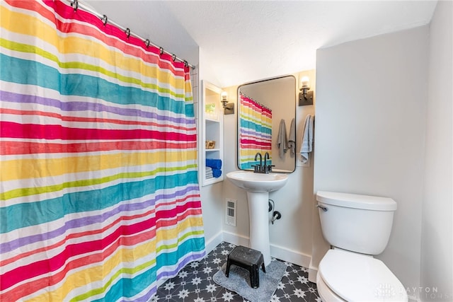 19 Klee Ave, Dayton, OH 45403 - full bathroom with toilet and curtained shower