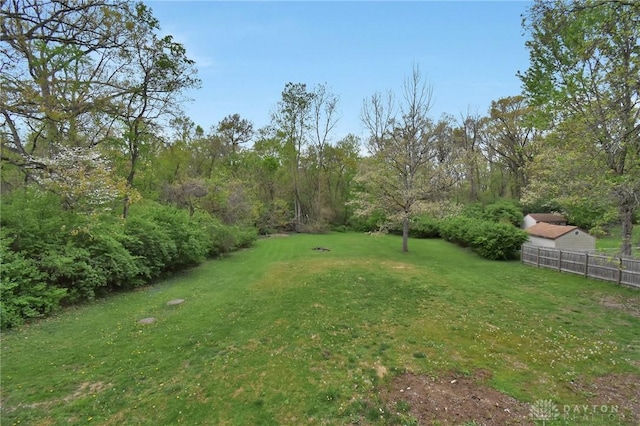 view of yard with fence