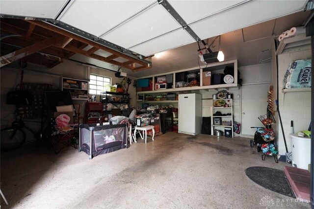 403 W Rahn Rd, Dayton, OH 45429 - garage featuring a garage door opener