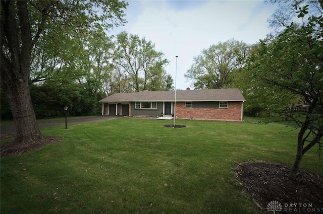 403 W Rahn Rd, Dayton, OH 45429 - ranch-style home with a garage, a front yard, brick siding, and aphalt driveway